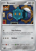 Bronzor 071/094 Common Phantasmal Flames Pokémon card